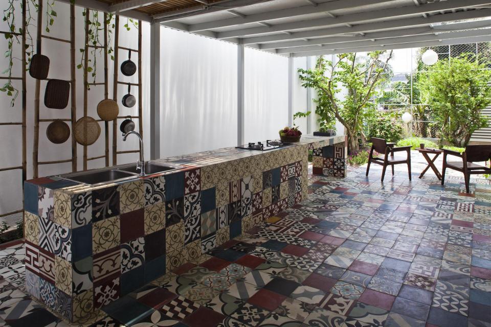 This small house in Vietnam has its ground floor living space open to the outdoors. It will eventually be covered by a screen of climbing plants. | www.facebook.com/SmallHouseBliss