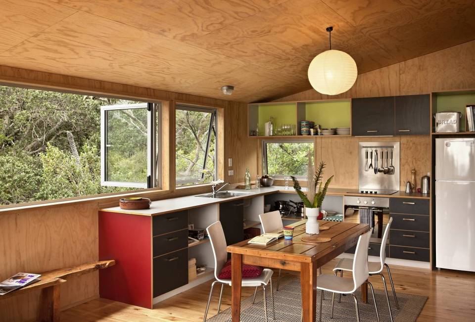 To get around this small hillside house, the owners must step outside; external decks and stairs serve as circulation space. The house has 3 bedrooms in 1,076 sq ft. | www.facebook.com/SmallHouseBliss