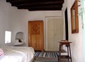 A traditional house on Mykonos was restored, staying true to the island's architectural history. It has two bedrooms and a loft in 840 sq ft. | www.facebook.com/SmallHouseBliss