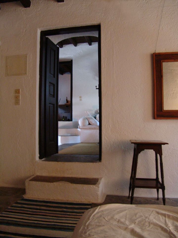 A traditional house on Mykonos was restored, staying true to the island's architectural history. It has two bedrooms and a loft in 840 sq ft. | www.facebook.com/SmallHouseBliss