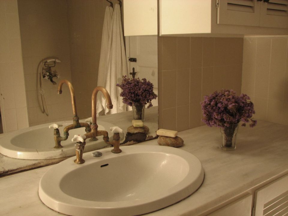 A traditional house on Mykonos was restored, staying true to the island's architectural history. It has two bedrooms and a loft in 840 sq ft. | www.facebook.com/SmallHouseBliss