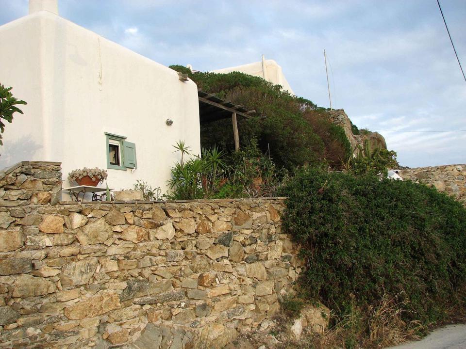 A traditional house on Mykonos was restored, staying true to the island's architectural history. It has two bedrooms and a loft in 840 sq ft. | www.facebook.com/SmallHouseBliss