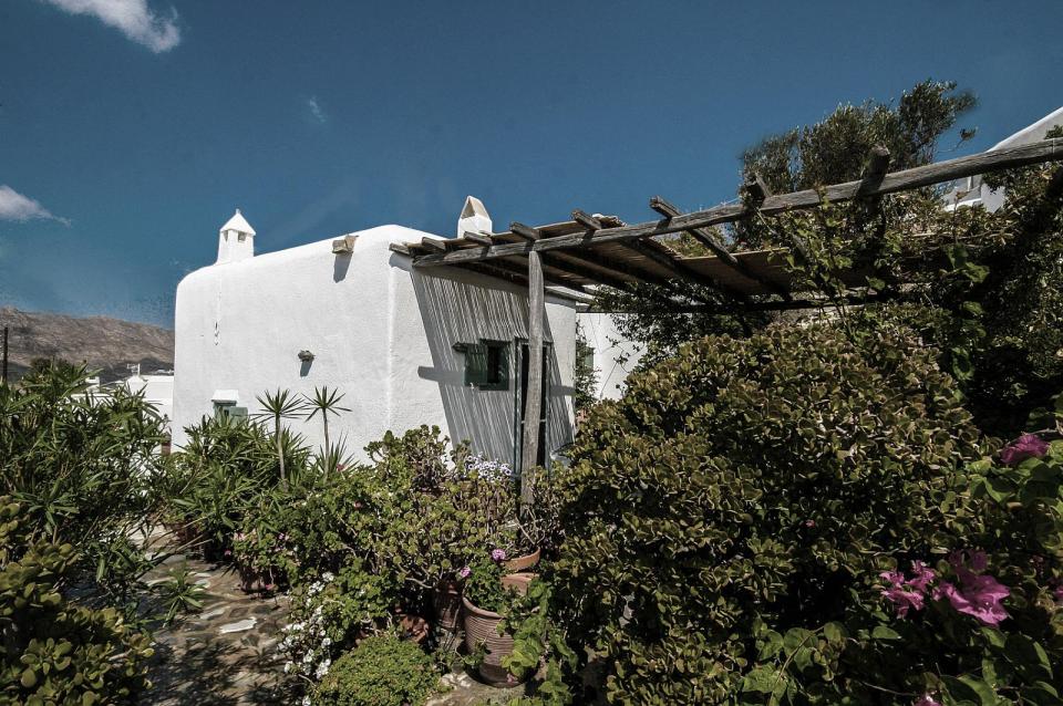 A traditional house on Mykonos was restored, staying true to the island's architectural history. It has two bedrooms and a loft in 840 sq ft. | www.facebook.com/SmallHouseBliss