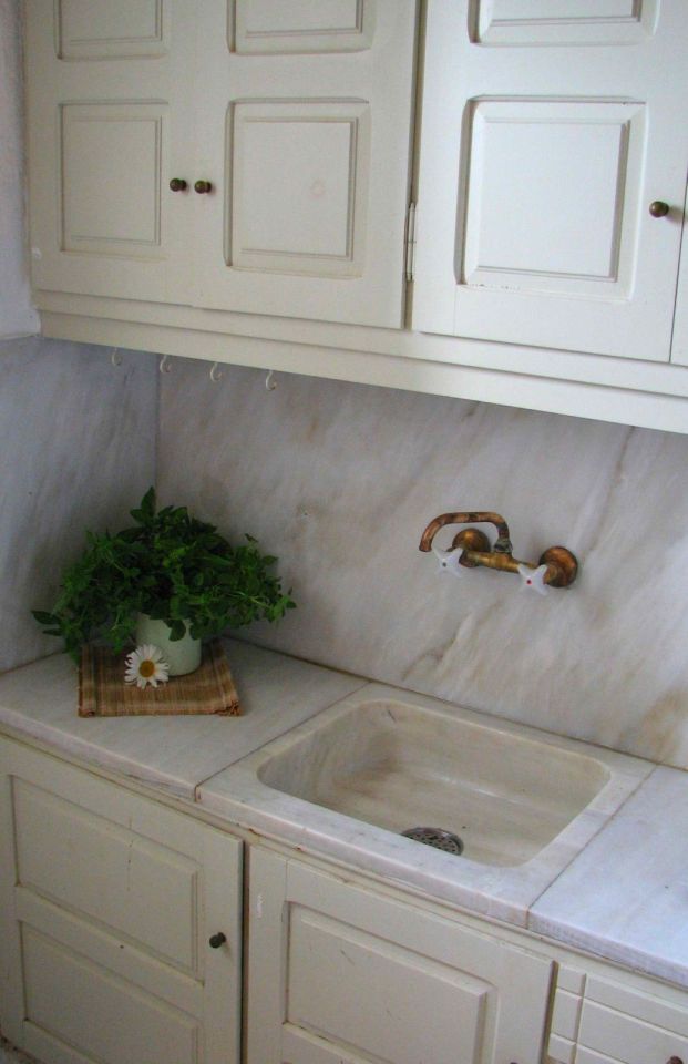 A traditional house on Mykonos was restored, staying true to the island's architectural history. It has two bedrooms and a loft in 840 sq ft. | www.facebook.com/SmallHouseBliss