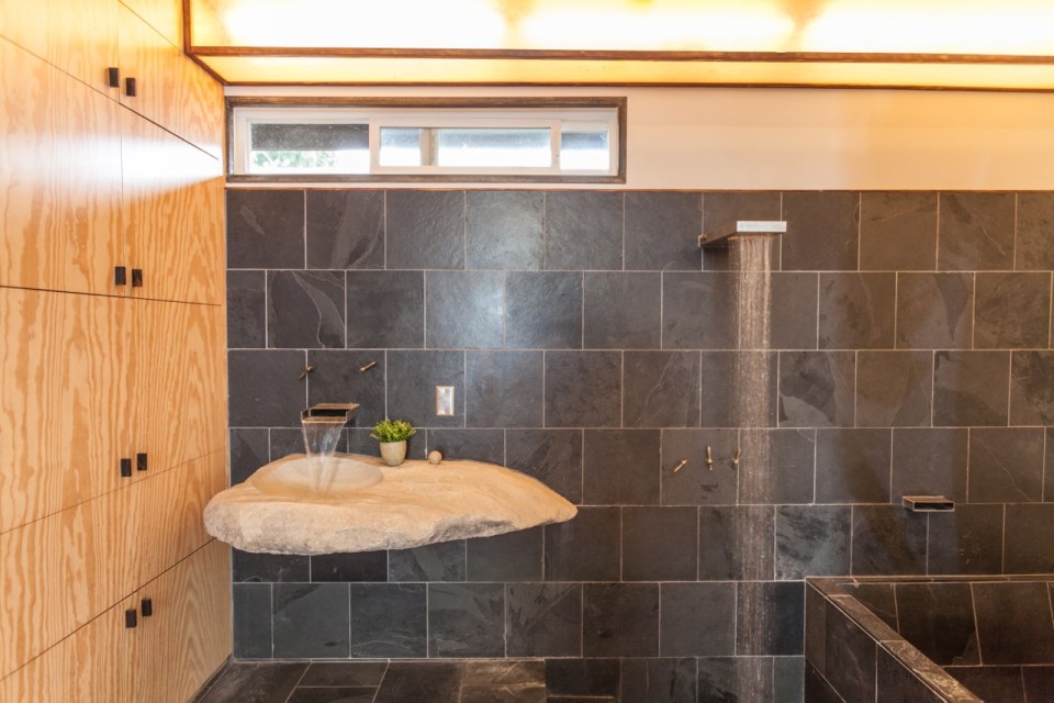 Mad Men actor Vincent Kartheiser's Hollywood pad with a "Japanese industrial" aesthetic. The 603 sq ft studio features a bed that drops from the ceiling. | www.facebook.com/SmallHouseBliss