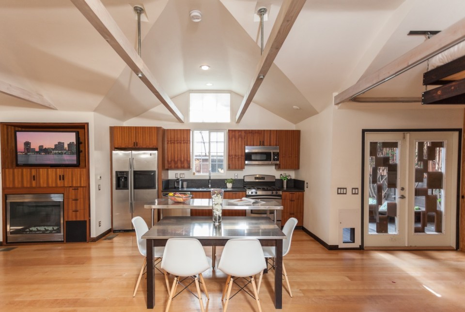 Mad Men actor Vincent Kartheiser's Hollywood pad with a "Japanese industrial" aesthetic. The 603 sq ft studio features a bed that drops from the ceiling. | www.facebook.com/SmallHouseBliss