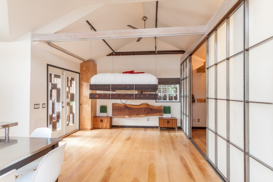 Mad Men actor Vincent Kartheiser's Hollywood pad with a "Japanese industrial" aesthetic. The 603 sq ft studio features a bed that drops from the ceiling. | www.facebook.com/SmallHouseBliss