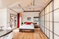 Mad Men actor Vincent Kartheiser's Hollywood pad with a "Japanese industrial" aesthetic. The 603 sq ft studio features a bed that drops from the ceiling. | www.facebook.com/SmallHouseBliss