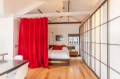 Mad Men actor Vincent Kartheiser's Hollywood pad with a "Japanese industrial" aesthetic. The 603 sq ft studio features a bed that drops from the ceiling. | www.facebook.com/SmallHouseBliss
