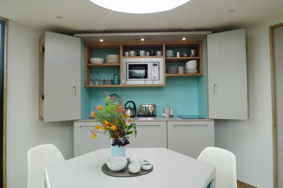 The Hivehaus is a modular dwelling designed to expand as needed. The hexagonal modules are joined to create a custom honeycomb floor plan. View all 14 photos at https://smallhousebliss.com/2014/08/21/hivehaus/.