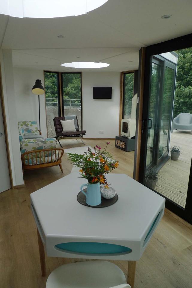 The Hivehaus is a modular dwelling designed to expand as needed. The hexagonal modules are joined to create a custom honeycomb floor plan. View all 14 photos at https://smallhousebliss.com/2014/08/21/hivehaus/.