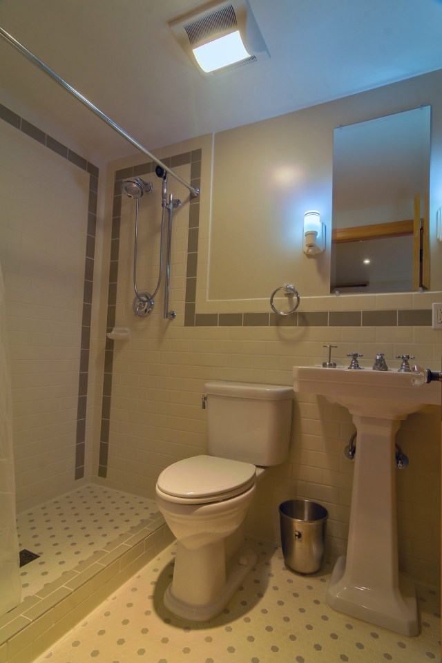 Though just 469 sq ft total, Susan's backyard cottage squeezes in spiral stairs to the loft bedroom. | www.facebook.com/SmallHouseBliss