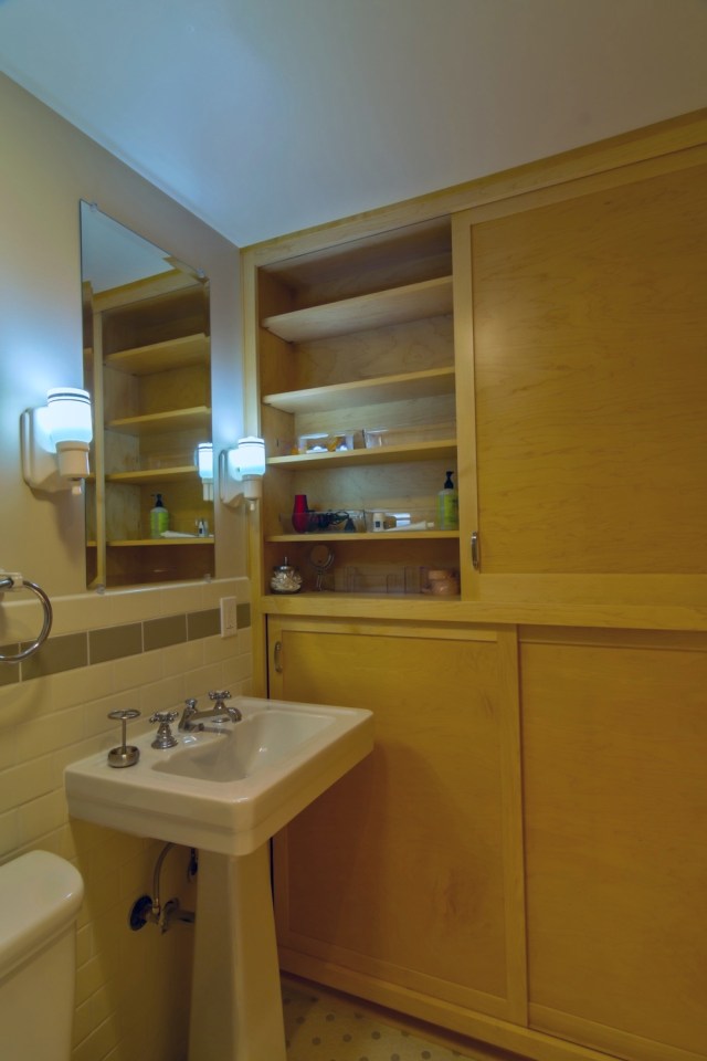 Though just 469 sq ft total, Susan's backyard cottage squeezes in spiral stairs to the loft bedroom. | www.facebook.com/SmallHouseBliss