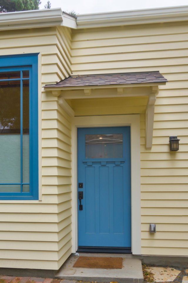 Though just 469 sq ft total, Susan's backyard cottage squeezes in spiral stairs to the loft bedroom. | www.facebook.com/SmallHouseBliss