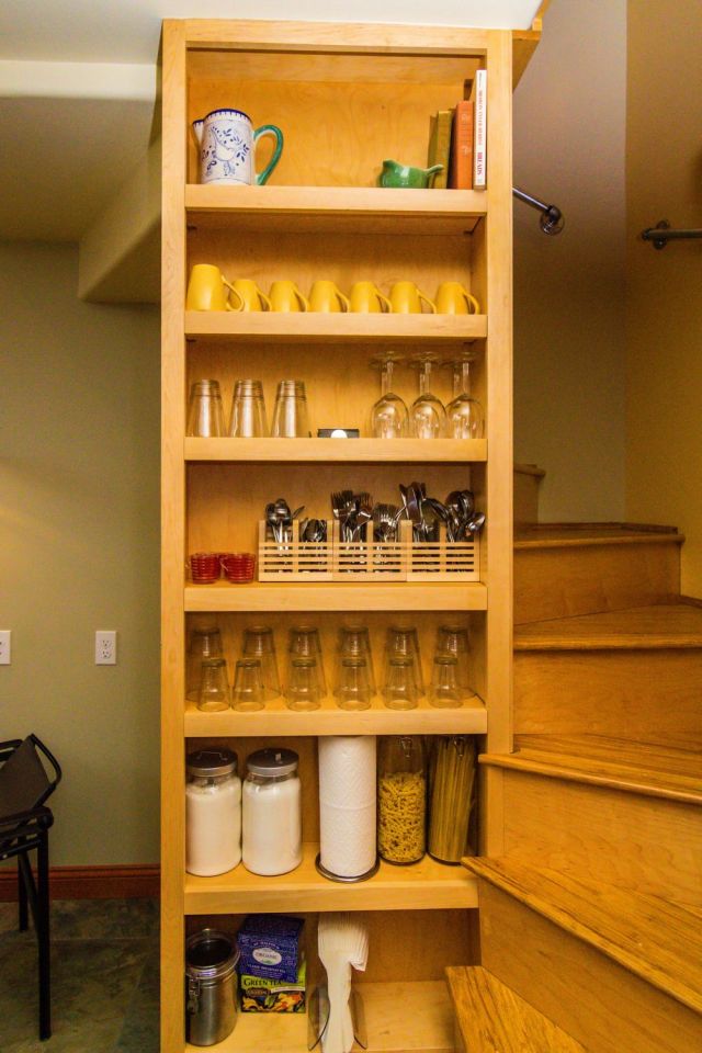 Though just 469 sq ft total, Susan's backyard cottage squeezes in spiral stairs to the loft bedroom. | www.facebook.com/SmallHouseBliss