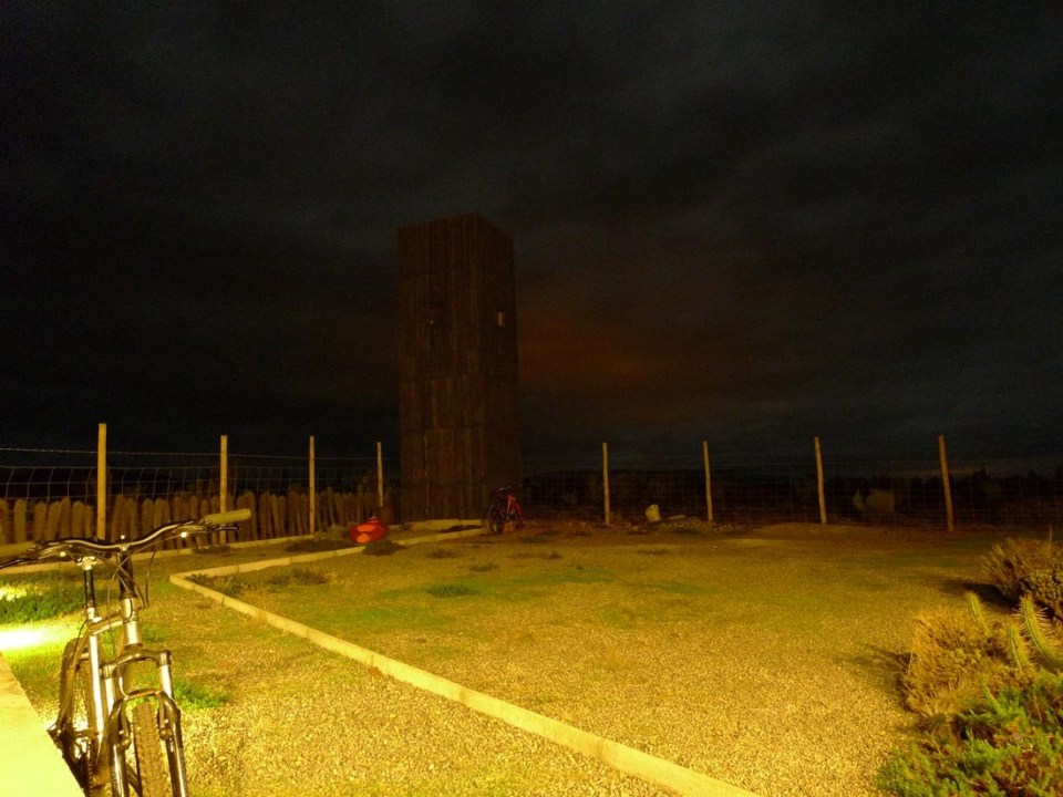 Located near a beach in Chile, this camping compound has a shipping container kitchen/bath, water tower and tent pads. | www.facebook.com/SmallHouseBliss