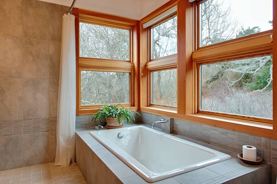 With a sod roof and weathered cedar siding, Eagle Point cabin blends with the San Juan Island landscape. It has 1 bedroom in 688 sq ft. | www.facebook.com/SmallHouseBliss