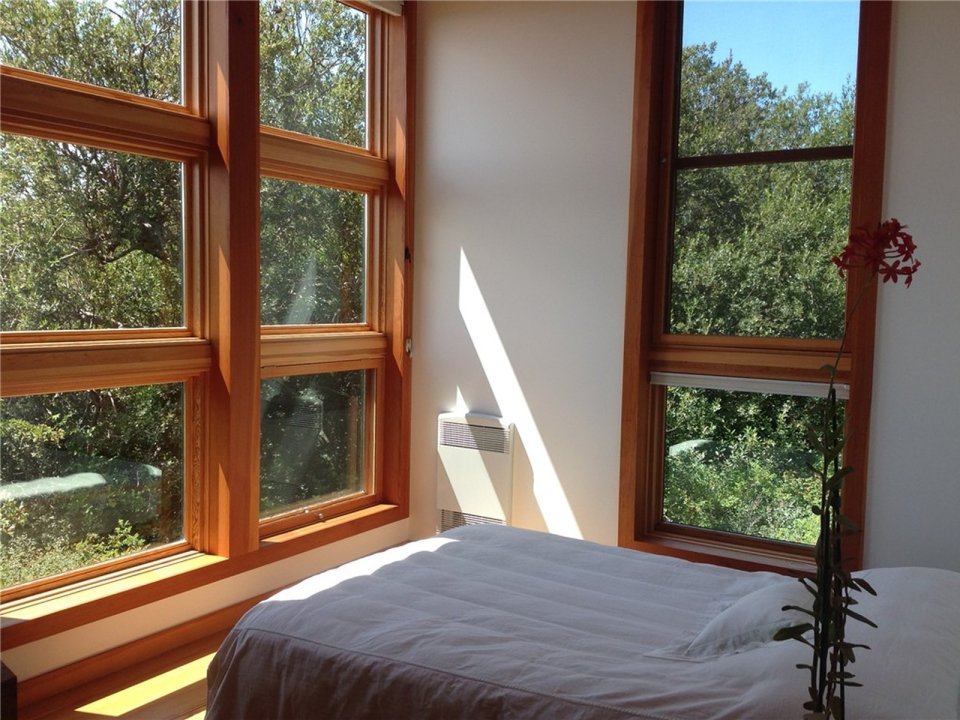 With a sod roof and weathered cedar siding, Eagle Point cabin blends with the San Juan Island landscape. It has 1 bedroom in 688 sq ft. | www.facebook.com/SmallHouseBliss