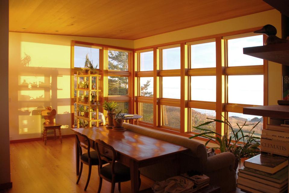 With a sod roof and weathered cedar siding, Eagle Point cabin blends with the San Juan Island landscape. It has 1 bedroom in 688 sq ft. | www.facebook.com/SmallHouseBliss