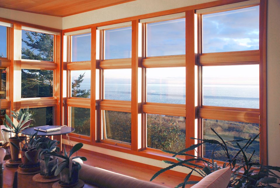 With a sod roof and weathered cedar siding, Eagle Point cabin blends with the San Juan Island landscape. It has 1 bedroom in 688 sq ft. | www.facebook.com/SmallHouseBliss