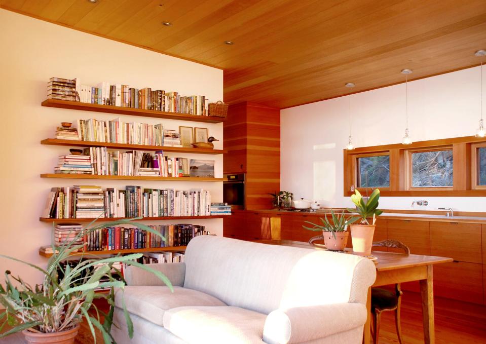With a sod roof and weathered cedar siding, Eagle Point cabin blends with the San Juan Island landscape. It has 1 bedroom in 688 sq ft. | www.facebook.com/SmallHouseBliss