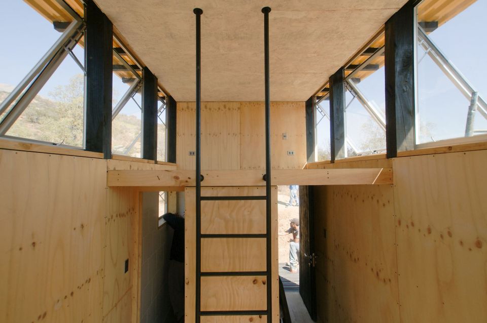 A small cabin in Chile designed as "a place to eat, sleep and read for two" and built for just $15,000. The studio cabin has a 161 sq ft footprint. | www.facebook.com/SmallHouseBliss