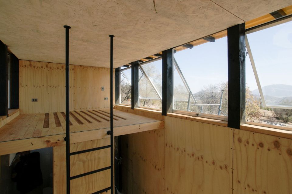 A small cabin in Chile designed as "a place to eat, sleep and read for two" and built for just $15,000. The studio cabin has a 161 sq ft footprint. | www.facebook.com/SmallHouseBliss