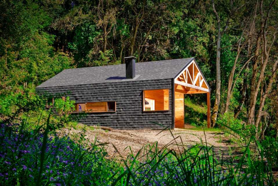 "Casa Bote" is a dual-use structure, serving as a cabin in the summer and a boat storage shed over the winter. | www.facebook.com/SmallHouseBliss