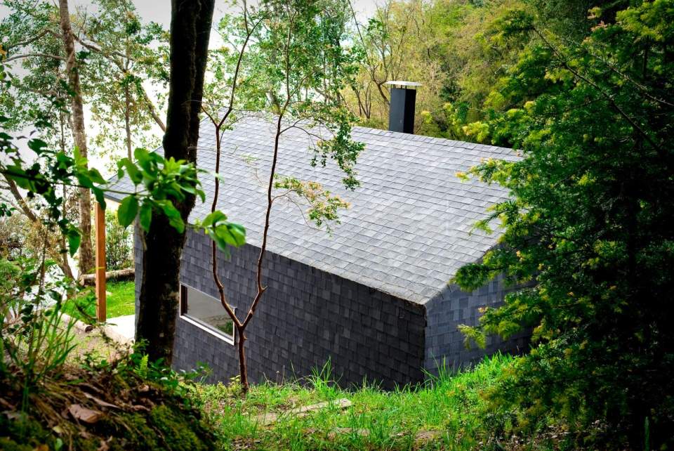 "Casa Bote" is a dual-use structure, serving as a cabin in the summer and a boat storage shed over the winter. | www.facebook.com/SmallHouseBliss