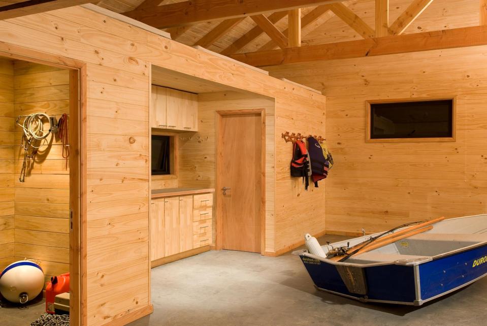 "Casa Bote" is a dual-use structure, serving as a cabin in the summer and a boat storage shed over the winter. | www.facebook.com/SmallHouseBliss