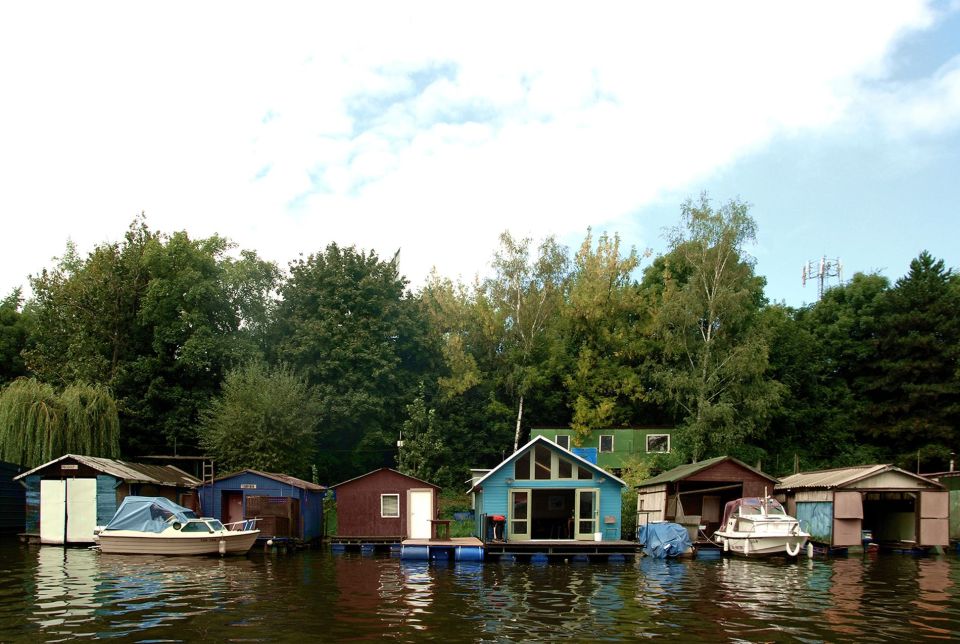 An old float house moored along a Prague riverbank was given a contemporary redesign. | www.facebook.com/SmallHouseBliss
