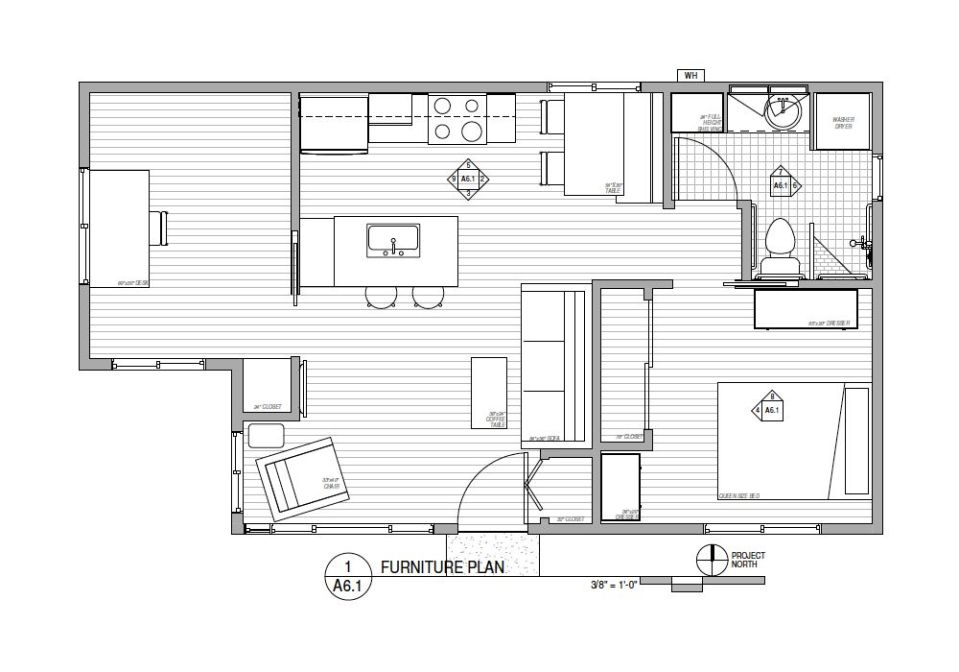 This stuccoed backyard cottage in California has 2 good-sized bedrooms in just 610 sq ft. | www.facebook.com/SmallHouseBliss