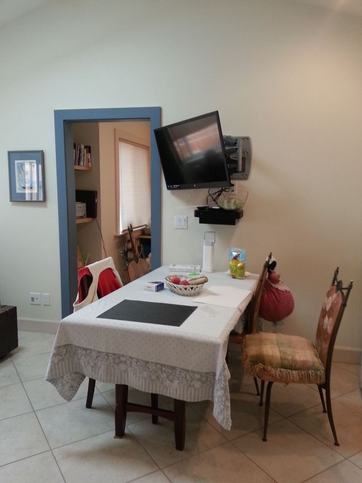 This stuccoed backyard cottage in California has 2 good-sized bedrooms in just 610 sq ft. | www.facebook.com/SmallHouseBliss