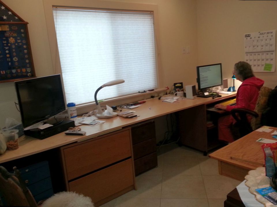 This stuccoed backyard cottage in California has 2 good-sized bedrooms in just 610 sq ft. | www.facebook.com/SmallHouseBliss