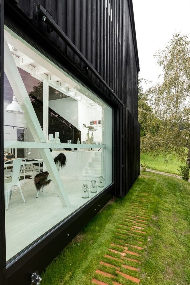 A small heritage barn was converted into a residence with a Scandinavian aesthetic. | www.facebook.com/SmallHouseBliss