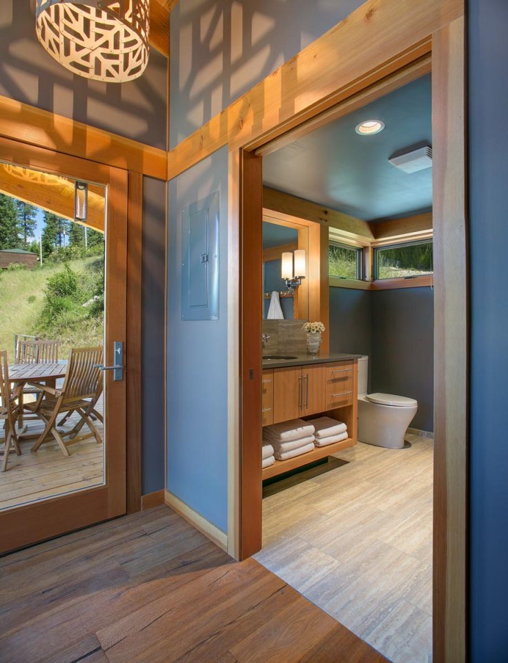 This timber framed cabin has modern lines and an energy-efficient shell. There is 1 bedroom in 550 sq ft. | www.facebook.com/SmallHouseBliss