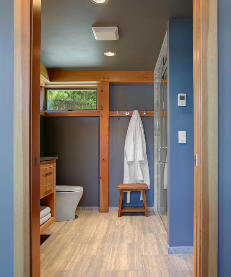 This timber framed cabin has modern lines and an energy-efficient shell. There is 1 bedroom in 550 sq ft. | www.facebook.com/SmallHouseBliss