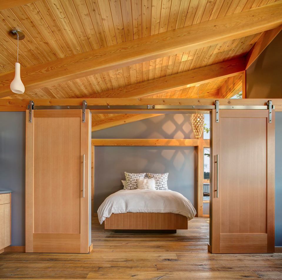This timber framed cabin has modern lines and an energy-efficient shell. There is 1 bedroom in 550 sq ft. | www.facebook.com/SmallHouseBliss