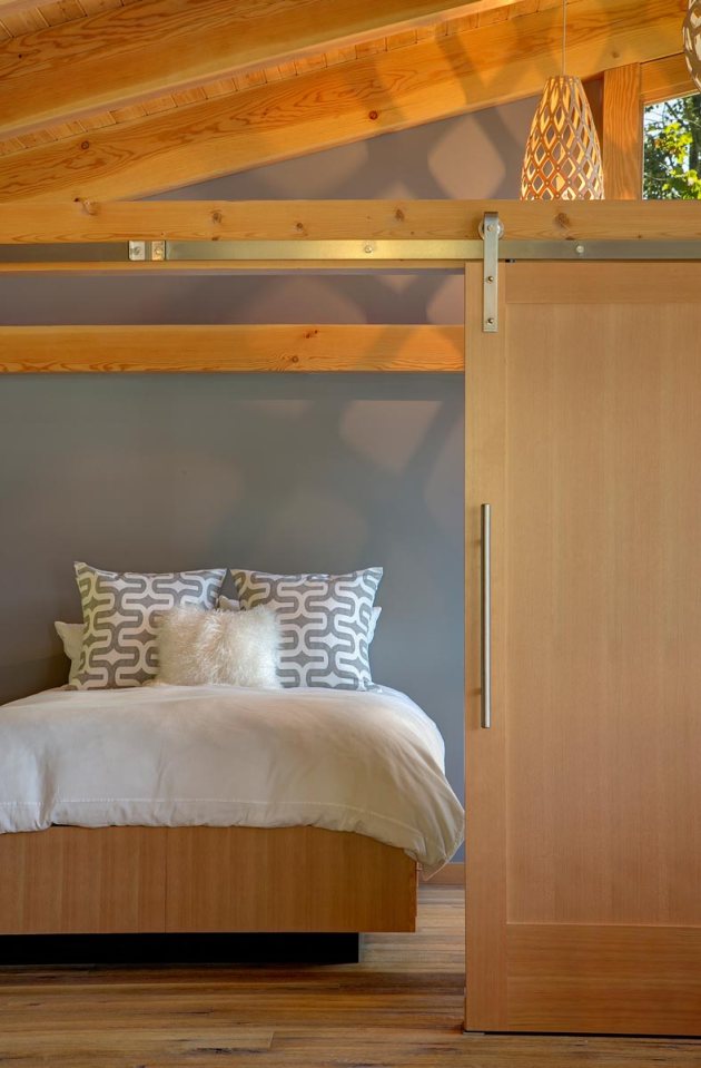 This timber framed cabin has modern lines and an energy-efficient shell. There is 1 bedroom in 550 sq ft. | www.facebook.com/SmallHouseBliss