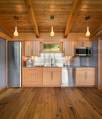 This timber framed cabin has modern lines and an energy-efficient shell. There is 1 bedroom in 550 sq ft. | www.facebook.com/SmallHouseBliss