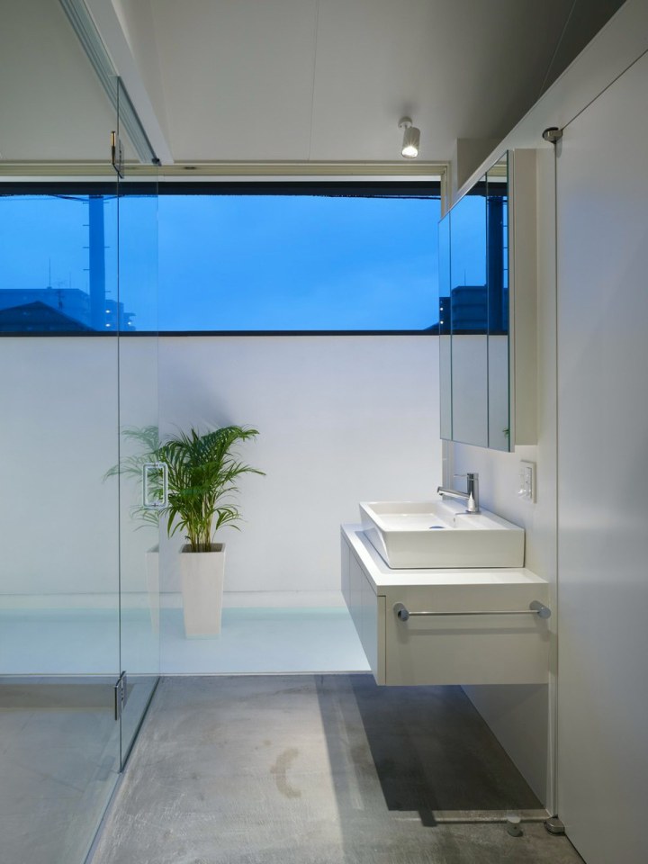 This small family home has an austere appearance but the wood-lined interior is warm and intimate. | www.facebook.com/SmallHouseBliss