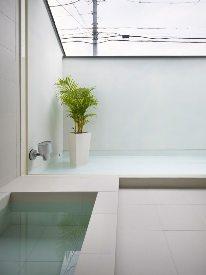 This small family home has an austere appearance but the wood-lined interior is warm and intimate. | www.facebook.com/SmallHouseBliss