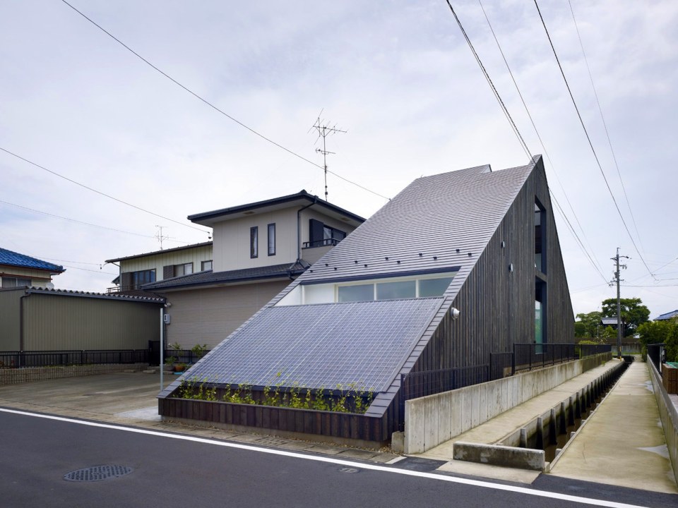 This small family home has an austere appearance but the wood-lined interior is warm and intimate. | www.facebook.com/SmallHouseBliss