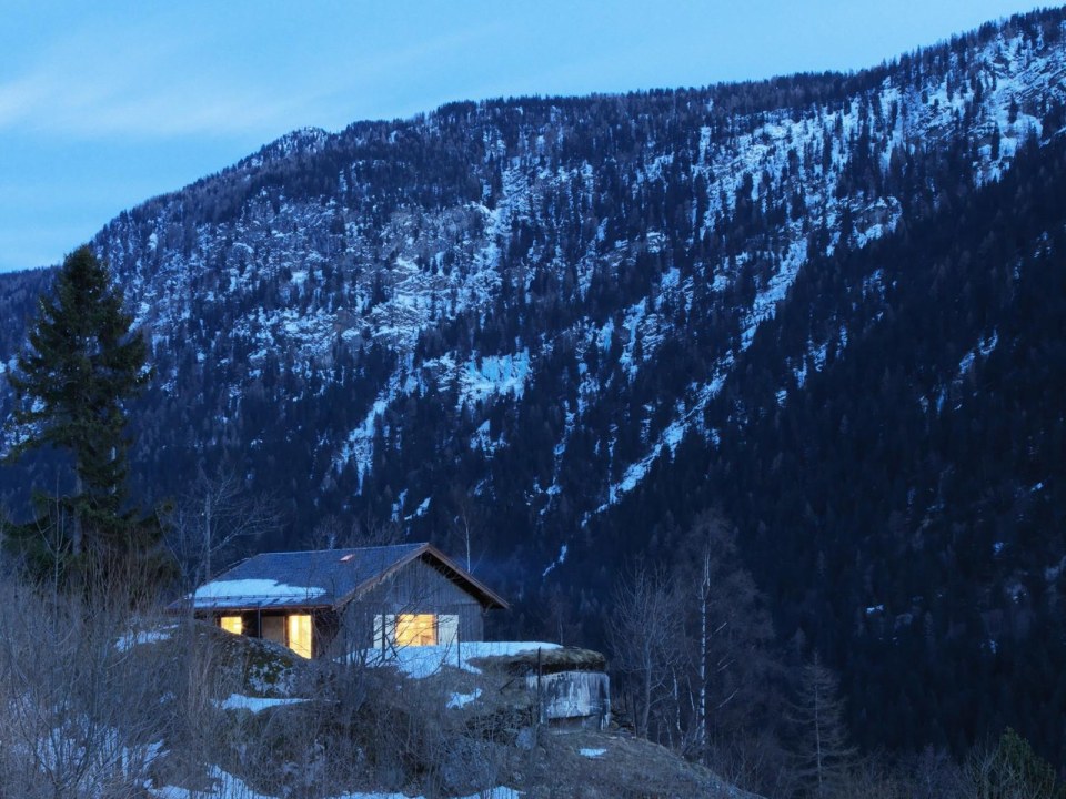 A WW II-era munitions storage building in the Swiss Alps was converted into this modern cabin with a 527 sq ft studio floor plan. | www.facebook.com/SmallHouseBliss