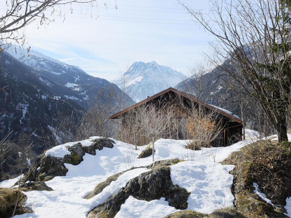A WW II-era munitions storage building in the Swiss Alps was converted into this modern cabin with a 527 sq ft studio floor plan. | www.facebook.com/SmallHouseBliss