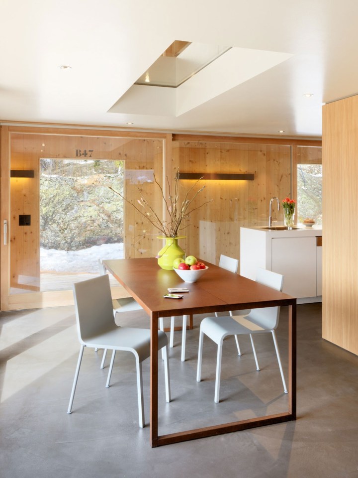 A WW II-era munitions storage building in the Swiss Alps was converted into this modern cabin with a 527 sq ft studio floor plan. | www.facebook.com/SmallHouseBliss