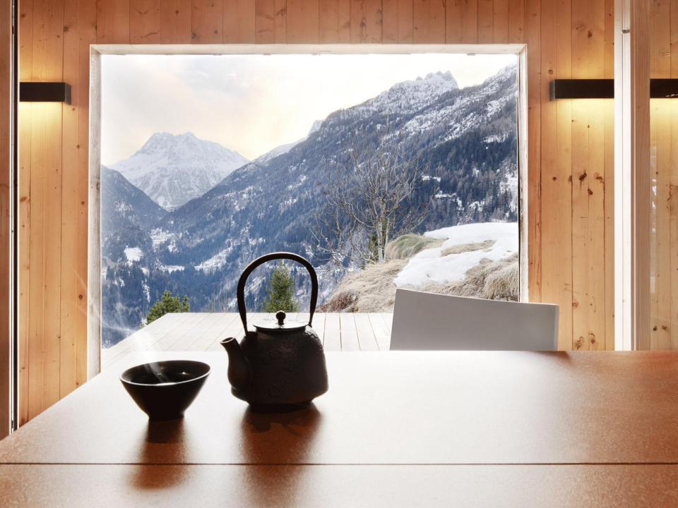 A WW II-era munitions storage building in the Swiss Alps was converted into this modern cabin with a 527 sq ft studio floor plan. | www.facebook.com/SmallHouseBliss