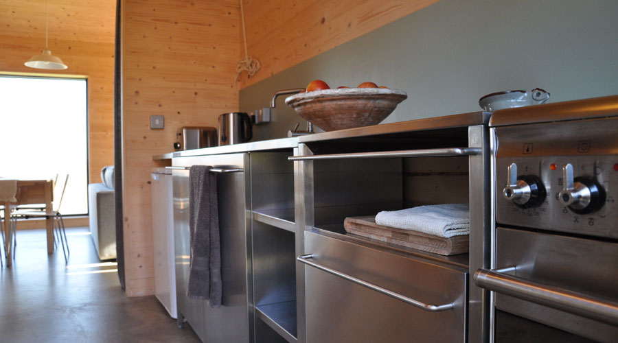The Black Shed, a simple farm cottage on the Isle of Skye inspired by the storage building it replaced. It has 2 bedrooms in 807 sq ft. | www.facebook.com/SmallHouseBliss