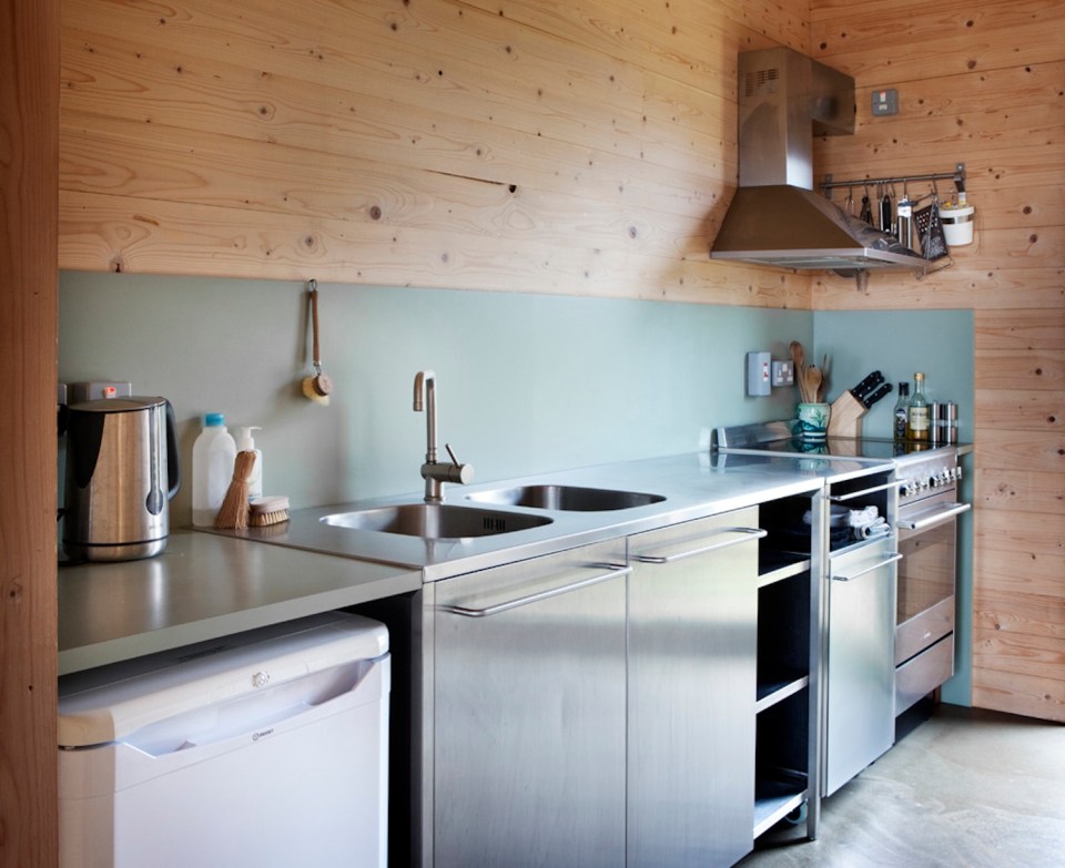 The Black Shed, a simple farm cottage on the Isle of Skye inspired by the storage building it replaced. It has 2 bedrooms in 807 sq ft. | www.facebook.com/SmallHouseBliss