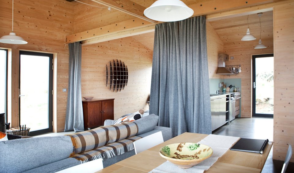 The Black Shed, a simple farm cottage on the Isle of Skye inspired by the storage building it replaced. It has 2 bedrooms in 807 sq ft. | www.facebook.com/SmallHouseBliss